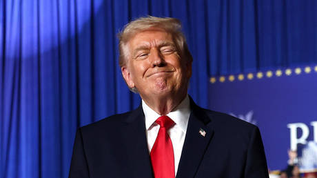 US President Donald Trump takes the stage to speak during a rally at the Horizon Events Center on January 27, 2026 in Clive, Iowa.