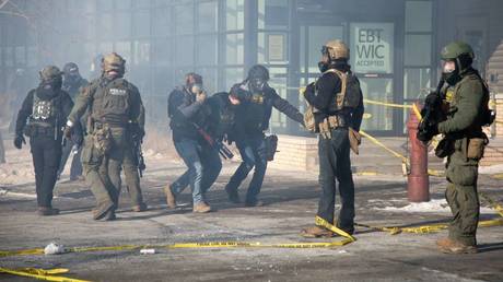 Federal agents fire tear gas during a demonstration following the shooting of a protester during a scuffle as agents attempted to arrest him in Minneapolis, United States, on January 24, 2026.