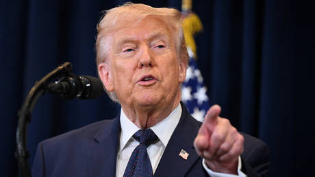 US President Donald Trump gestures as he speaks during a news conference at Trump National Doral Miami on March 9, 2026, in Florida.