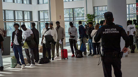 Migrants leave a holding facility in Ceuta, Spain, February 11, 2026 © Getty Images / Antonio Sempere