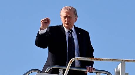 US President Donald Trump boards Air Force One on March 1, 2026 in West Palm Beach, Florida.