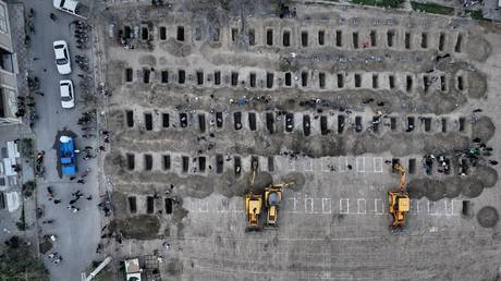 Graves being prepared for the victims, mostly children, of what Iranian officials said was an Israeli-US strike on February 28 at a girls' elementary school in Minab, Iran, March 2, 2026.