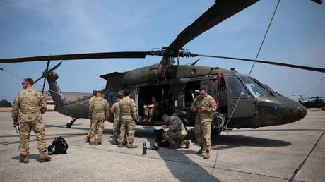 FILE PHOTO: Troops the US Army's 82nd Airborne team boarding a Black Hawk helicopter.