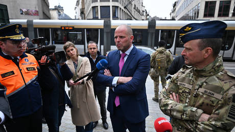 FILE PHOTO: Belgian Defense Minister Theo Francken (C).