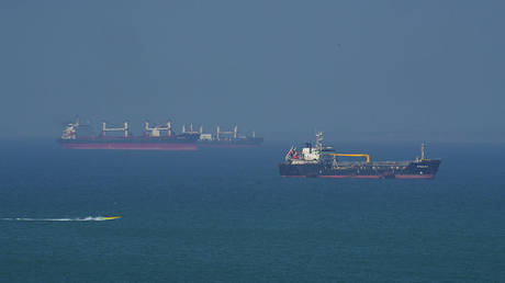 An oil tanker sails near Iran’s Qeshm Island in the Strait of Hormuz, April 28, 2026.