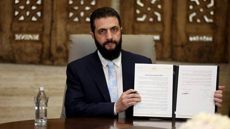 Syrian President Ahmed al-Sharaa announces a peace deal with the Kurdish-led Syrian Democratic Forces (SDF), Damascus, Syria, January 18, 2026.