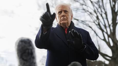 US President Donald Trump speaking to reporters on the South Lawn of the White House.