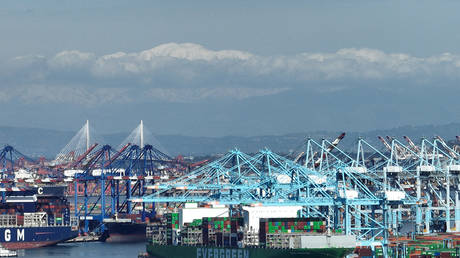 A shipping container ship is unloaded at the Port of Los Angeles on February 20, 2026 in San Pedro, California.