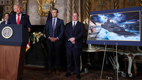 FILE PHOTO: President Trump joined by Secretary of War Pete Hegseth and Secretary of the Navy John Phelan announces the creation of the “Trump-class” battleship on December 22, 2025