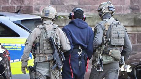 Sergey K., suspected mastermind of the Nord Stream pipeline explosions, escorted by police, Karlsruhe, Baden‑Württemberg, November 27, 2025.