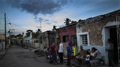 FILE PHOTO. People talk outside their homes during a blackout, Havana, Cuba, November 10, 2024.