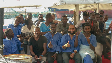 FILE PHOTO. African migrants and refugees arrive in Spain by rescue boat in August 2018.