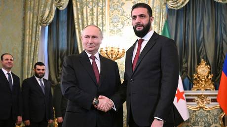 Russian President Vladimir Putin (L) and Syrian President Ahmed al-Sharaa (R), Moscow, Russia, October 15, 2025.