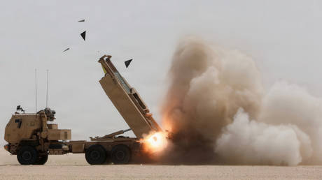 A US Army High Mobility Artillery Rocket System (HIMARS) fires missiles in support of Operation Epic Fury against Iran on February 28, 2026.