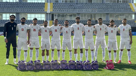 The Iranian National Team players appear on the field with school backpacks in honor of the victims of a suspected US strike on a girls’ school in Minab, Antalya, Türkiye, March 27, 2026.