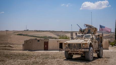 FILE PHOTO. A US tactical vehicle patrolling near Manbij, Syria, June 24, 2018