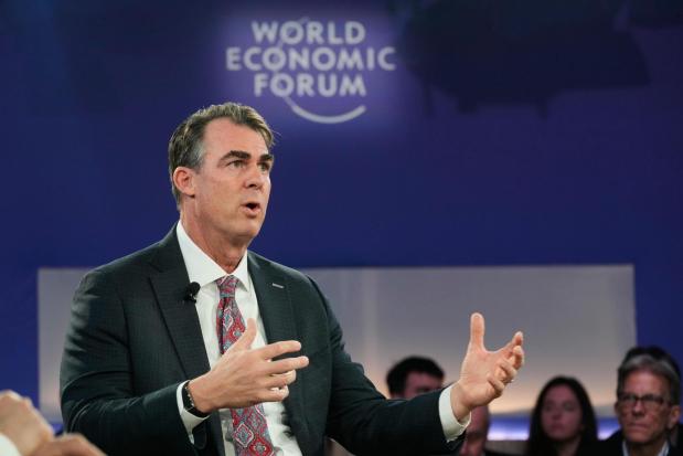 Oklahoma Gov. Kevin Stitt speaks during the Annual Meeting of the World Economic Forum in Davos, Switzerland, Wednesday, Jan. 21, 2026. (AP Photo/Markus Schreiber)