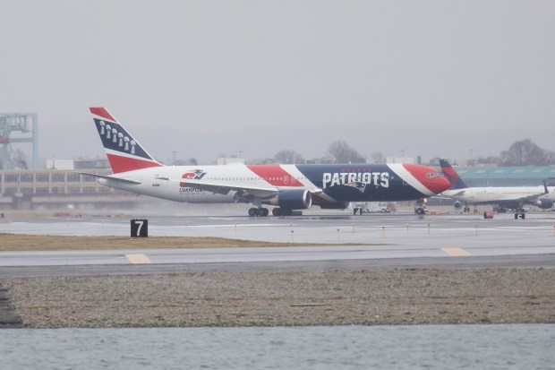 BOSTON, MA: April 2, 2020: The New England Patriots plane arrives at Boston Logan Airport carrying critically needed personal protective equipment from China in Boston, Massachusetts.(Staff photo by Nicolaus Czarnecki/MediaNews Group/Boston Herald)