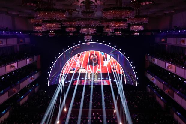 Singer Robbie Williams and singer and actor Nicole Scherzinger perform 