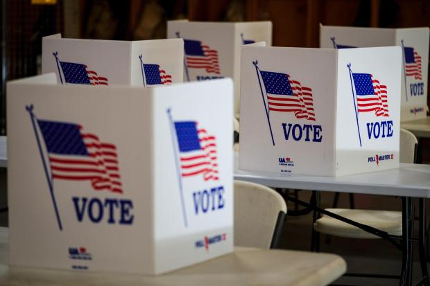 FILE- Voting booths are set up at a polling place in Newtown, Pa, April 23, 2024. (AP Photo/Matt Rourke, File)