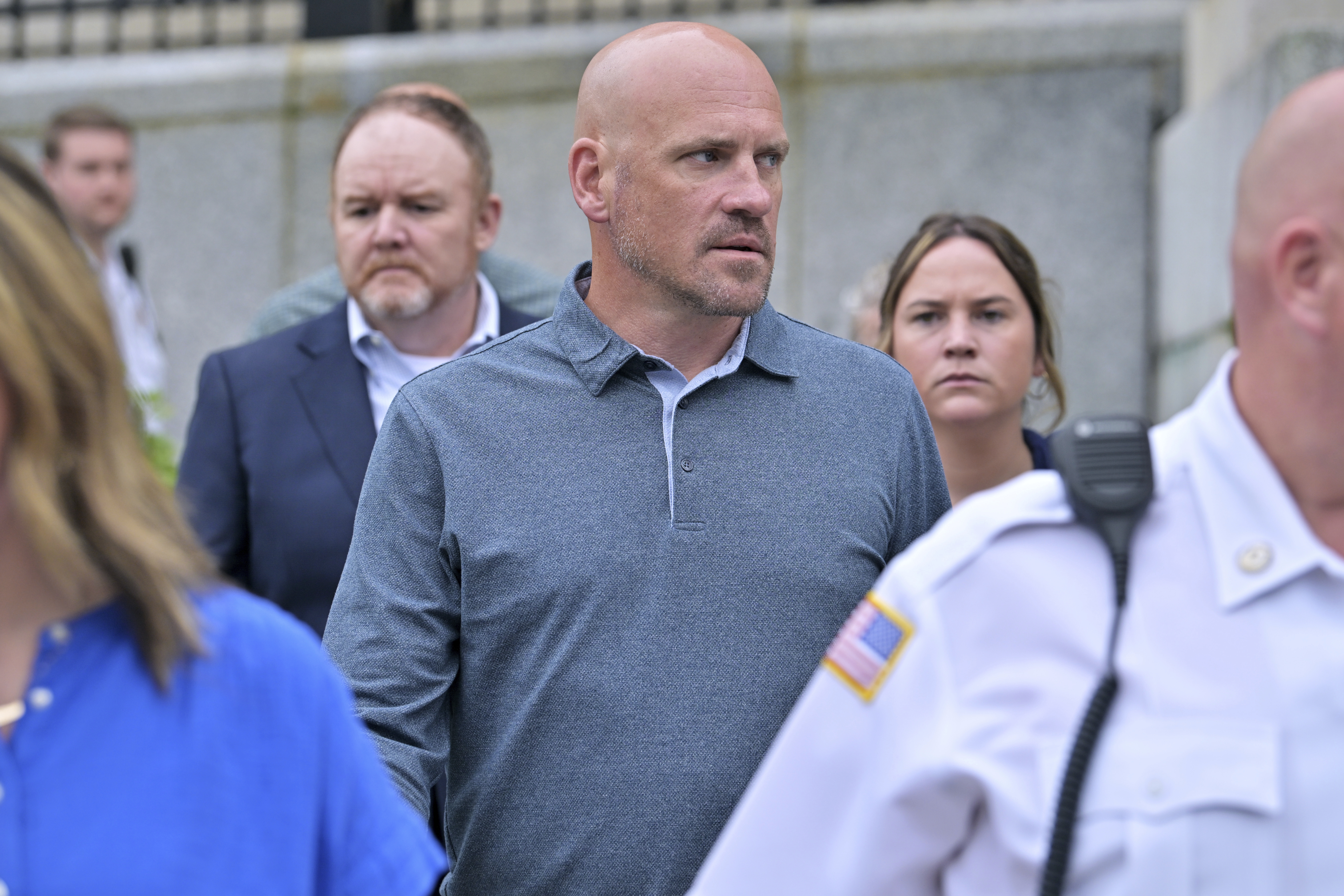 Paul O'Keefe, brother of John O'Keefe, looks toward Karen Read...