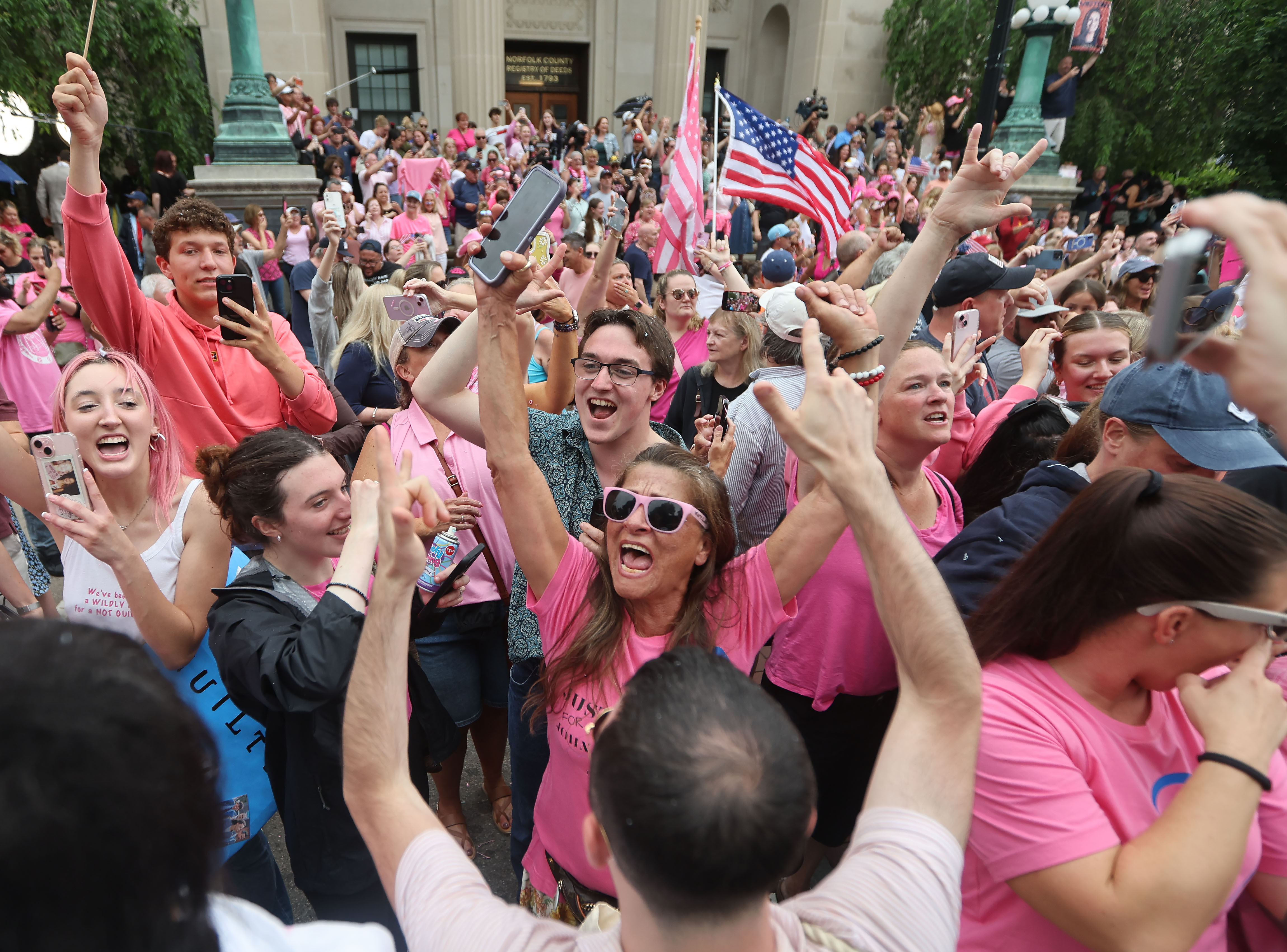 Karen Read greets her supporters after she is acquitted on...
