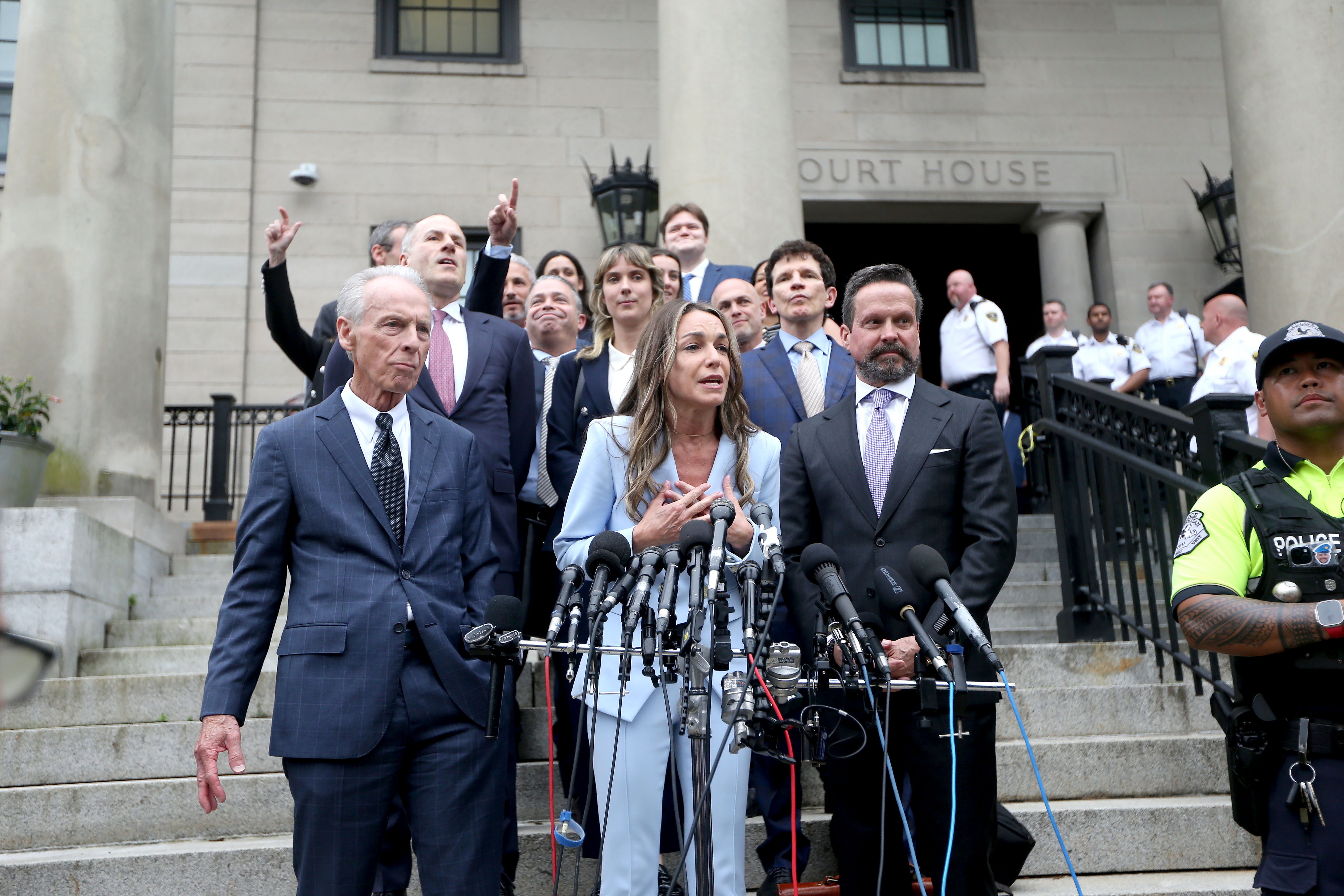 Karen Read greets her supporters after she is acquitted on...