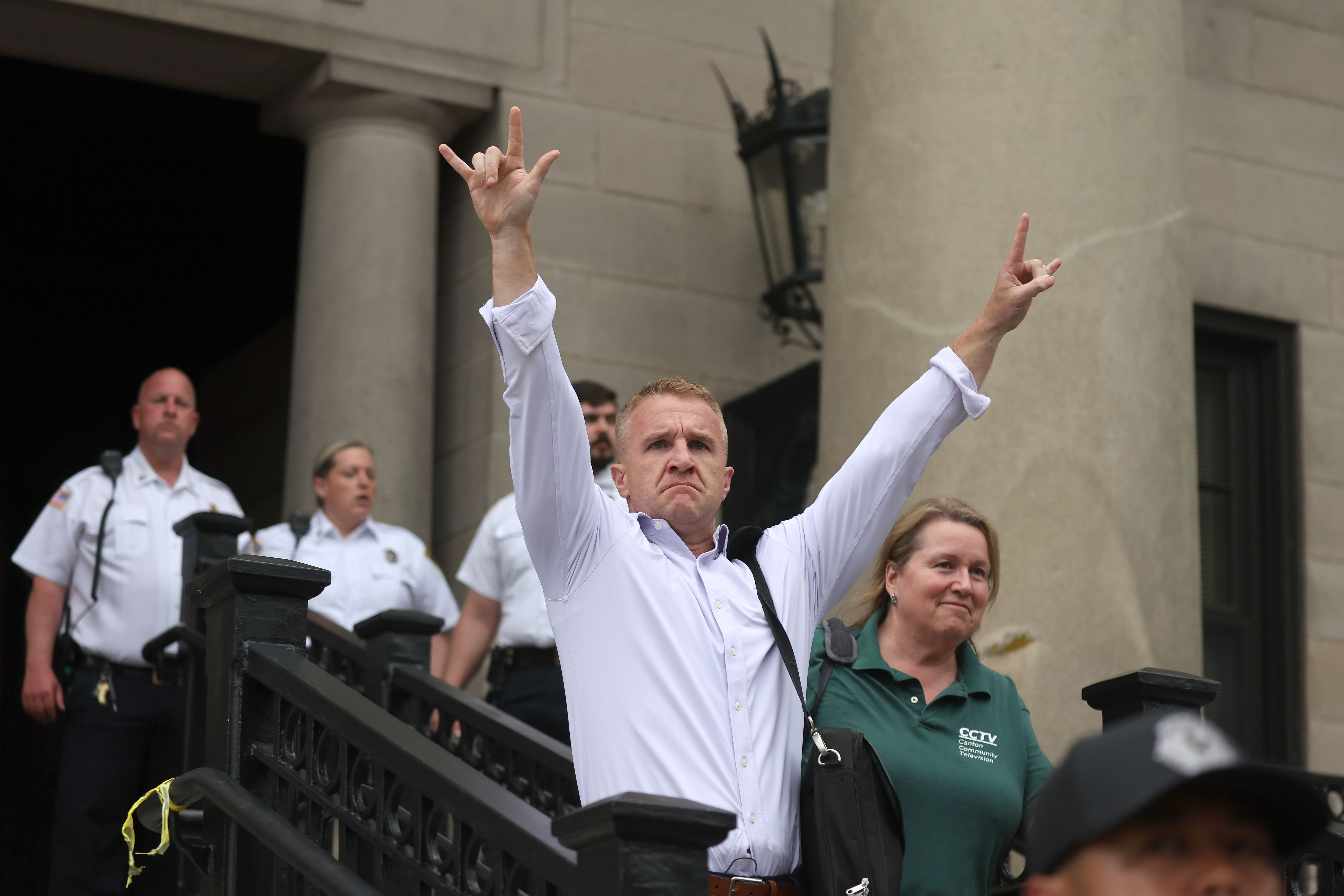 KareTurtleboy Aidan T. Kearney celebrates as he leaves court as...