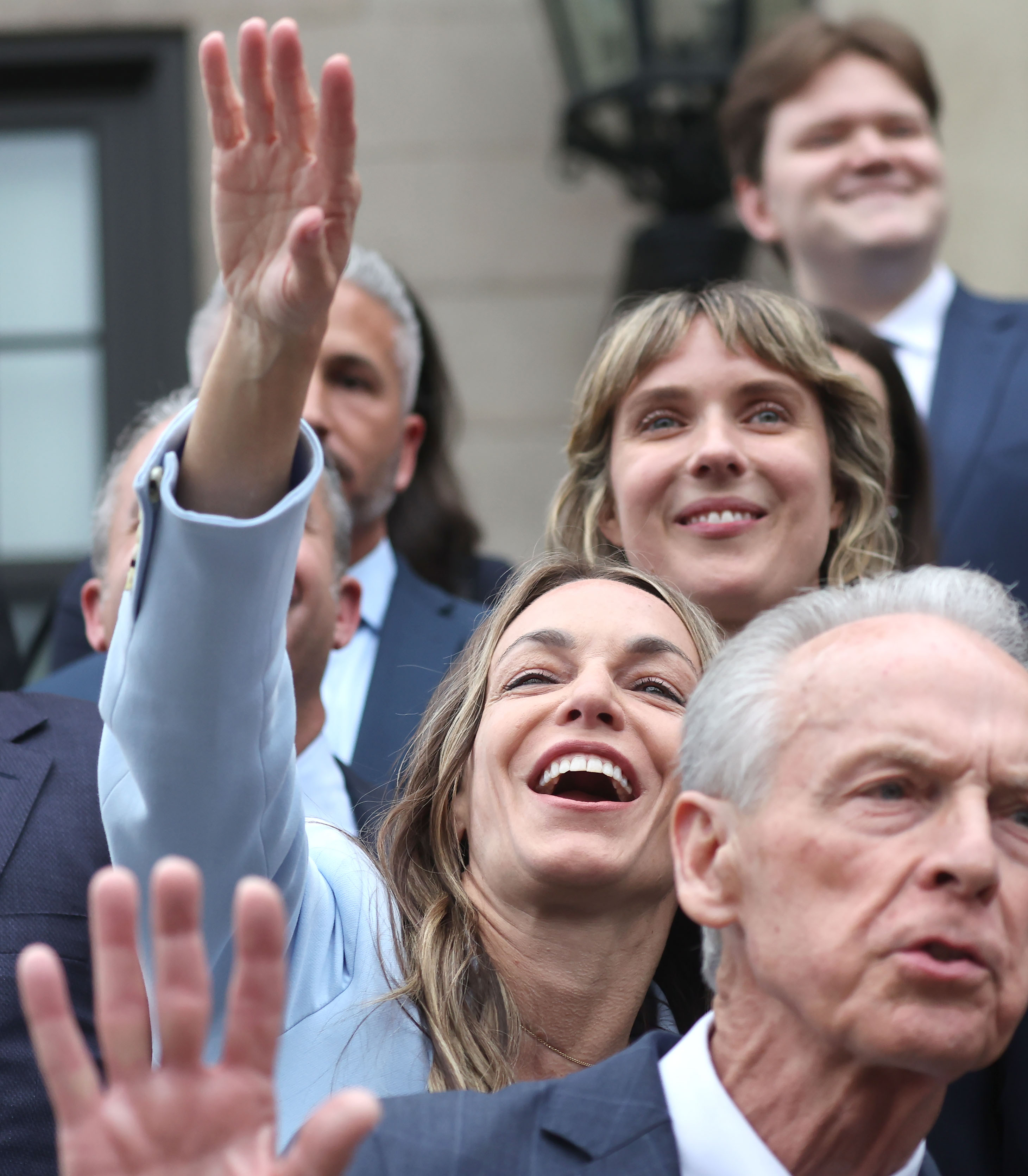 Karen Read greets her supporters after she is acquitted on...