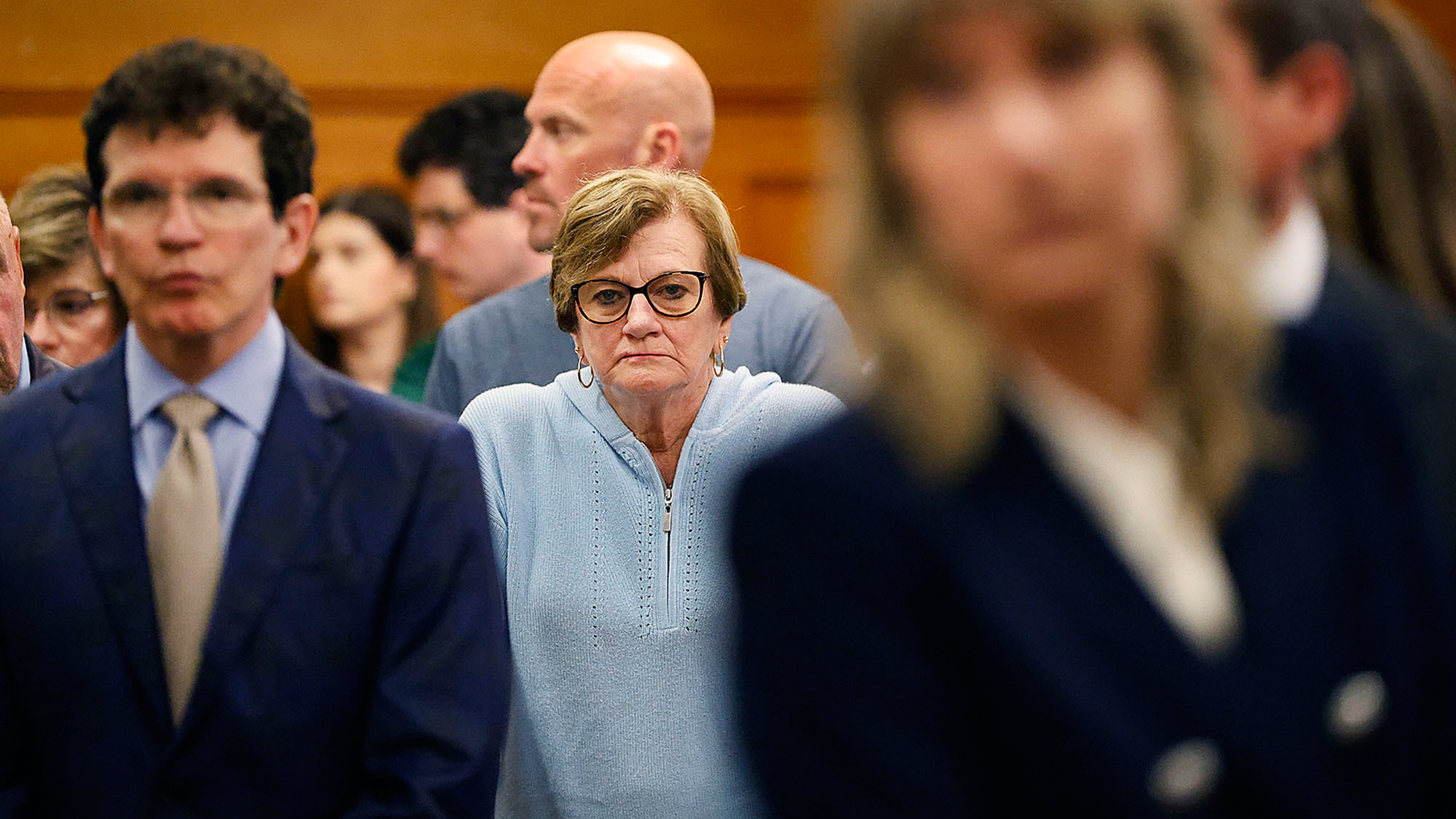 Peggy O'Keefe, mother of John O'Keefe watches as the jury...