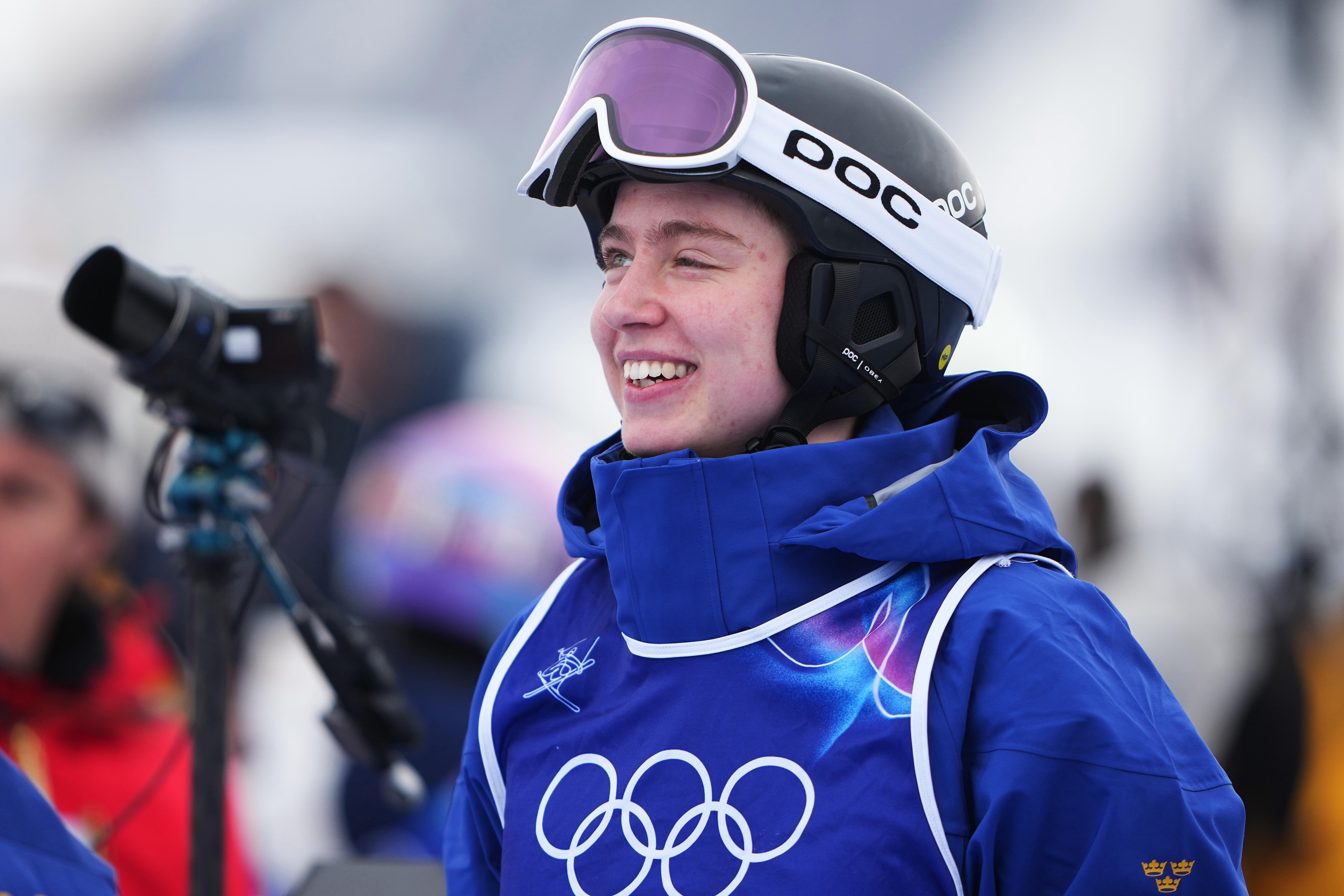 Sweden’s Elis Lundholm look on before the women’s freestyle skiing...