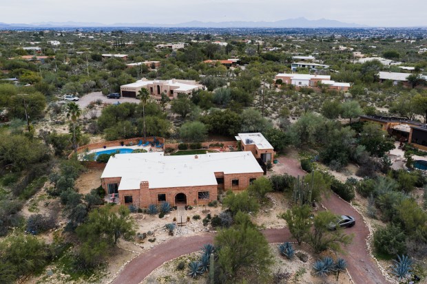 The home of Nancy Guthrie, the missing mother of "Today" show host Savannah Guthrie, is seen from above, Thursday, Feb. 5, 2026, in Tucson, Ariz. (AP Photo/Caitlin O'Hara)