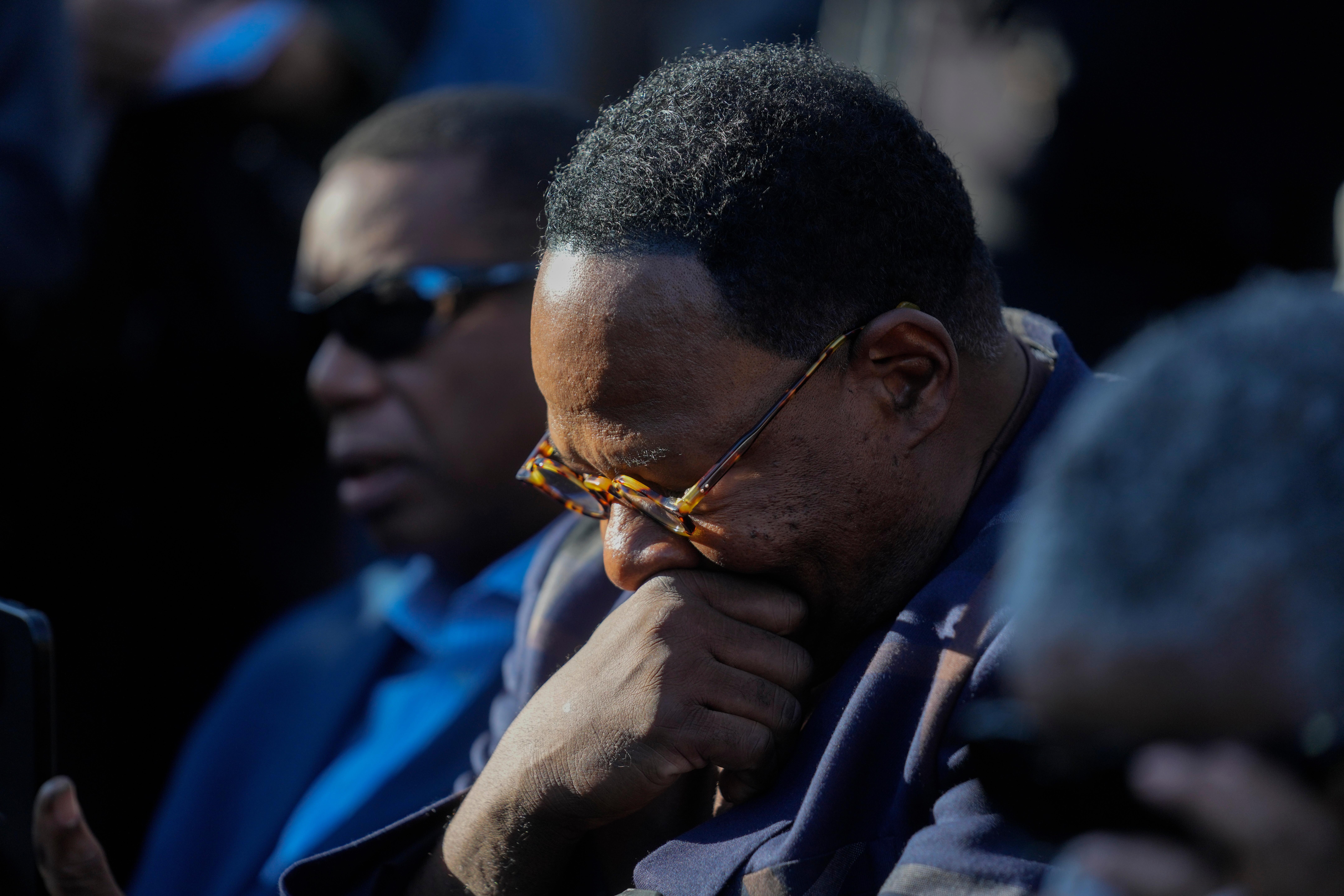 Darius Brooks is emotional during a news conference regarding the...