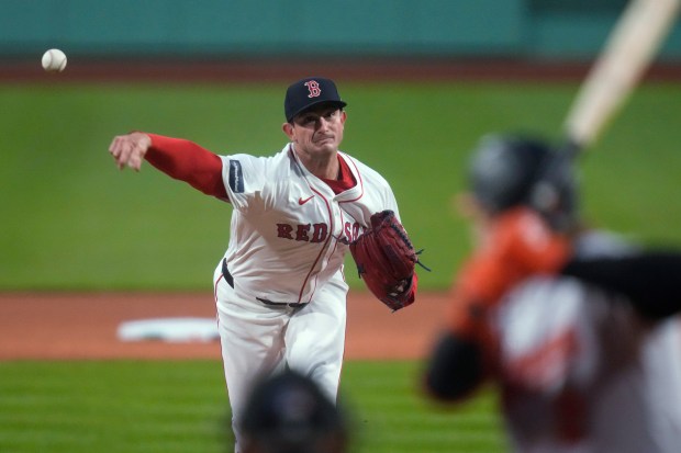 Boston Red Sox pitcher Garrett Whitlock delivers a pitch during the first inning of a game against the Baltimore Orioles at Fenway Park on April 11, 2024. (AP Photo/Charles Krupa)
