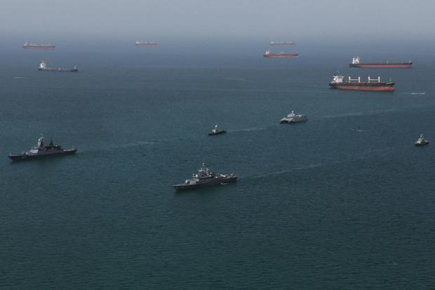 Navy ships conduct operations during a join drill by Iranian and Russian forces in the Indian Ocean.