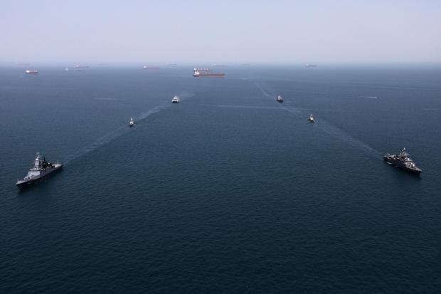 Navy ships conduct operations during a join drill by Iranian and Russian forces in the Indian Ocean.