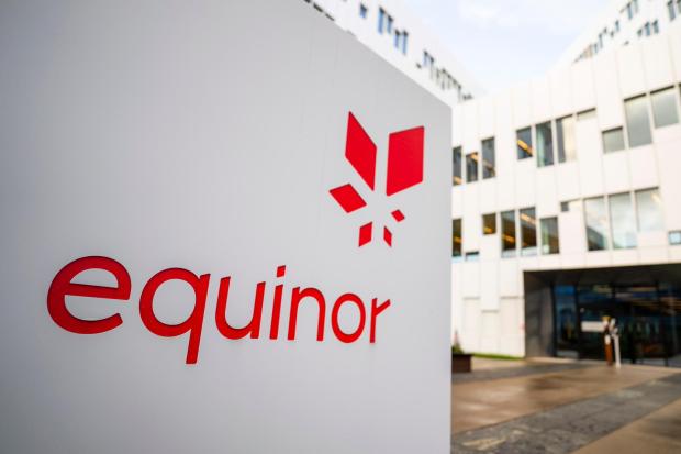 A sign for the company Equinor is displayed on Oct. 28, 2020, in Fornebu, Norway