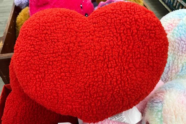 A Valentine heart cushion is seen at a grocery store in Buffalo Grove, Ill., Monday, Feb. 9, 2026. (AP Photo/Nam Y. Huh)
