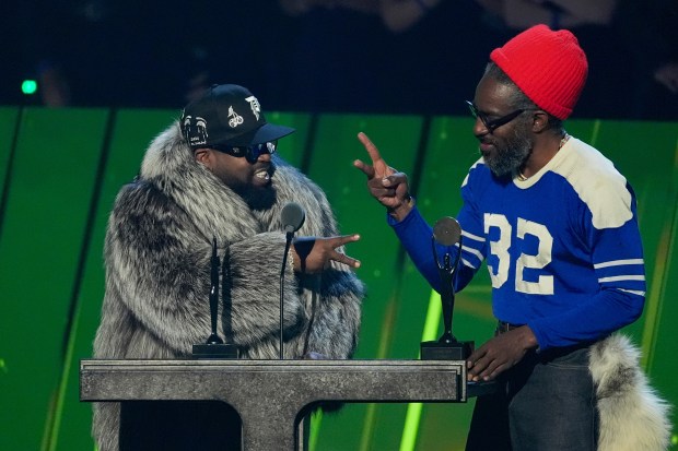 Inductees Big Boi, left and André 3000 of OutKast speak during the 2025 Rock and Roll Hall of Fame Induction Ceremony on Saturday at L.A. Live in Los Angeles. (AP Photo/Chris Pizzello)