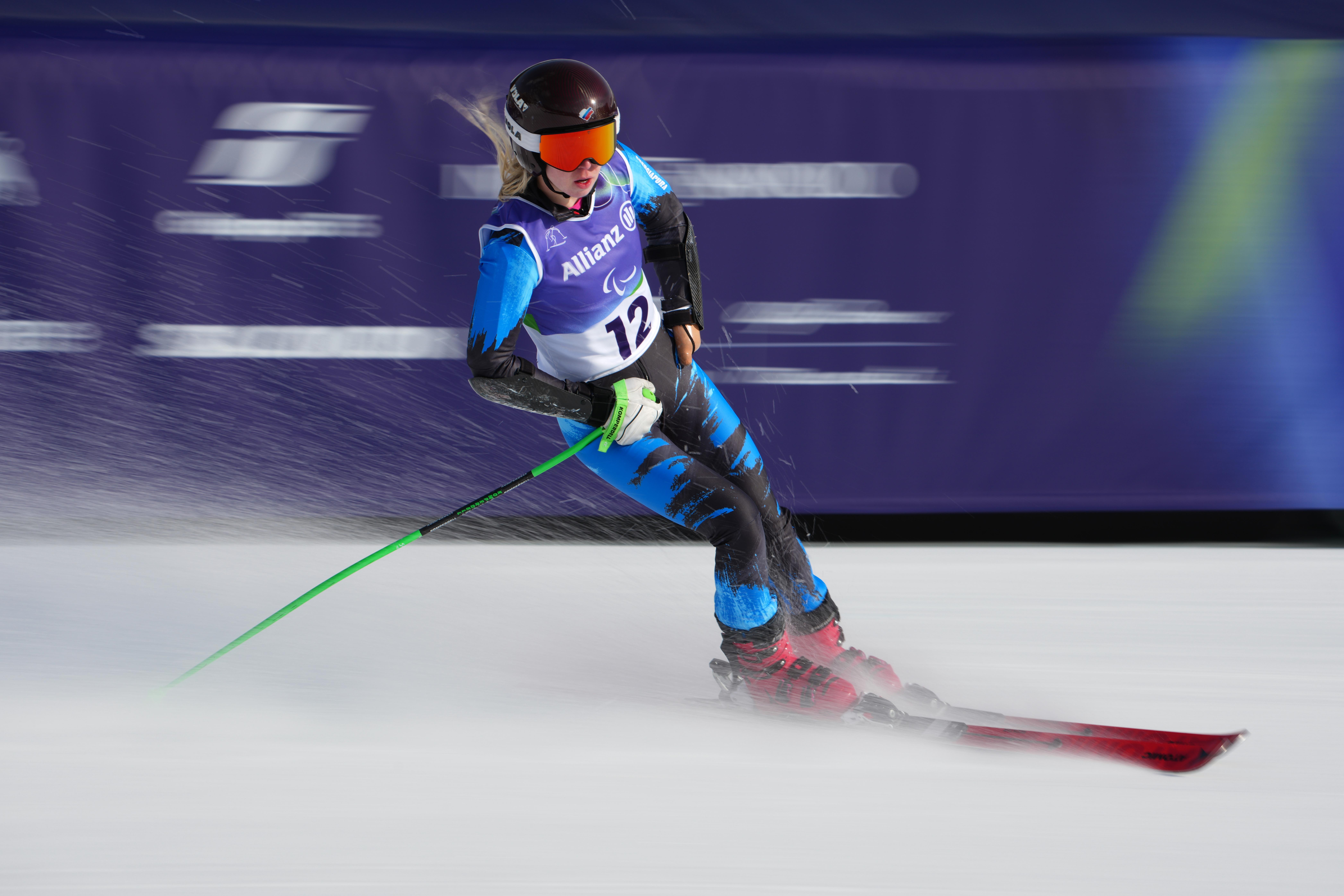Varvara Voronchikhina, of Russia, crosses the finish line in the alpine skiing women's super-G standing final.