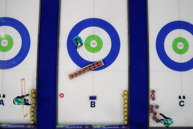 Preparations for the first curling competition are made at the 2026 Winter Olympics
