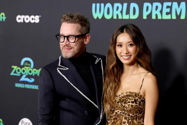 From left to right: Macaulay Culkin and Brenda Song attend the world premiere of Zootopia 2 at El Capitan Theatre on Nov. 13, 2025