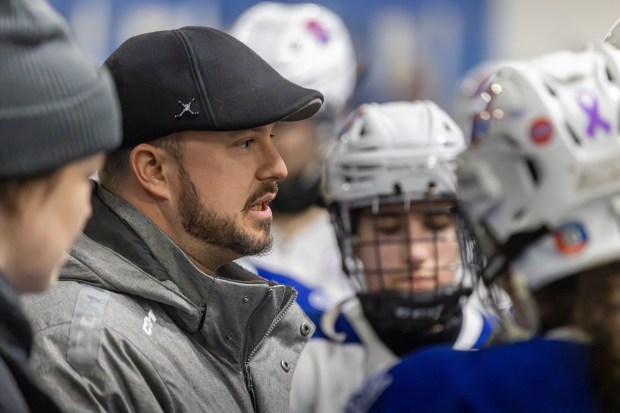 Methuen/Tewksbury interim coach Ryan Sheehy fires up his team during a 3-0 win over Central Catholic. (James Thomas for the Lowell Sun)
