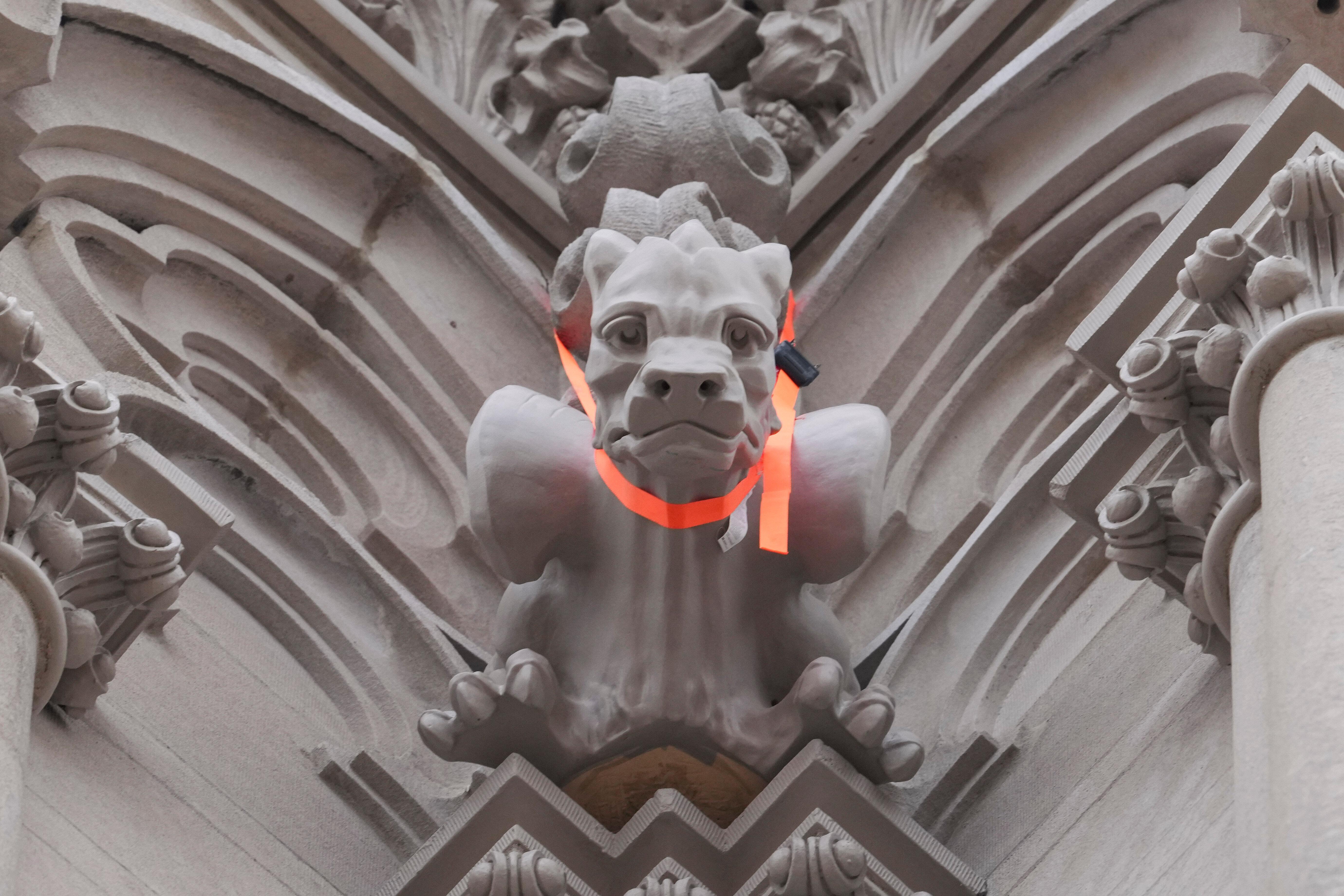 A general view of gargoyles being installed on the Cathedral...