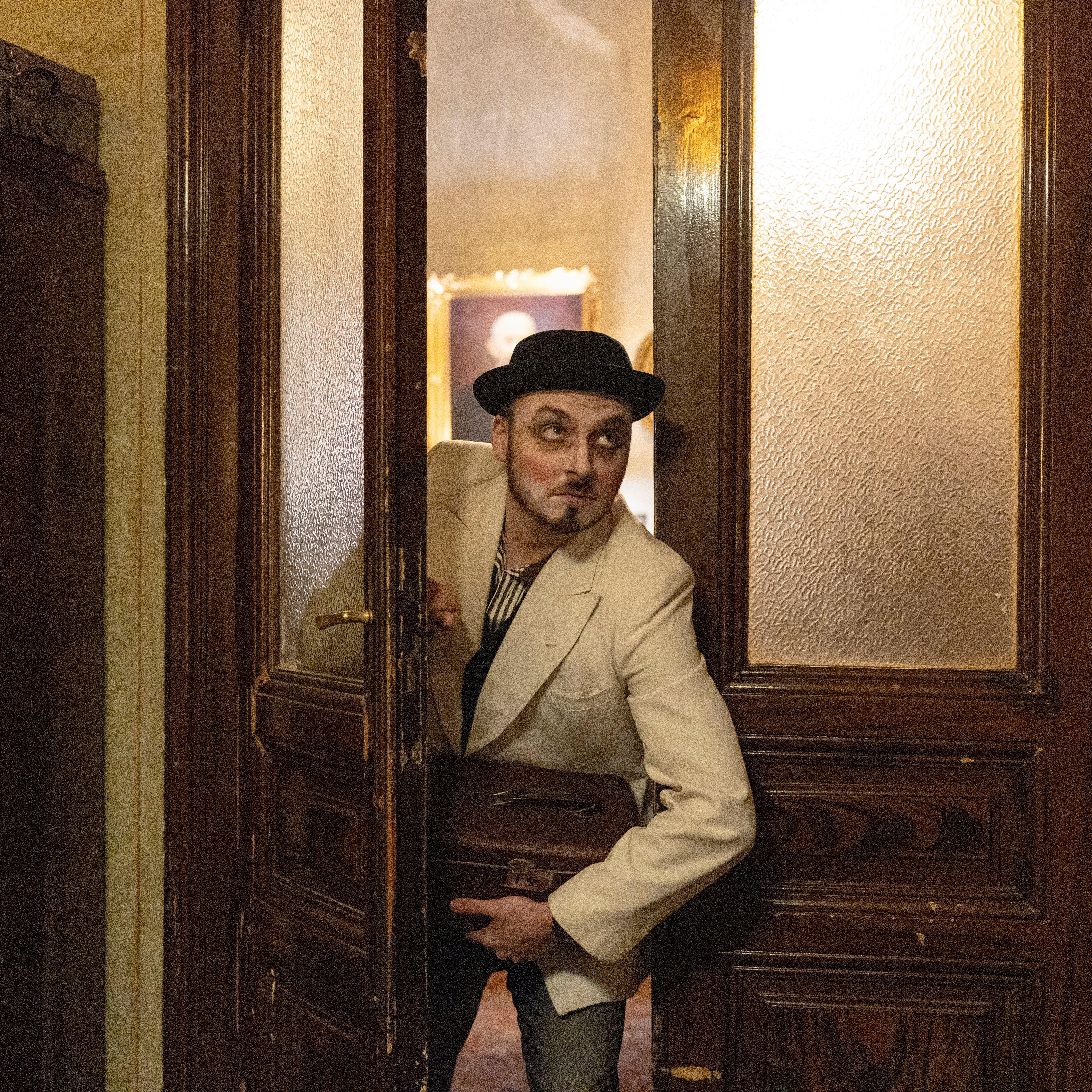 Dragomir Kadovic, an amateur actor, poses for a photograph in...