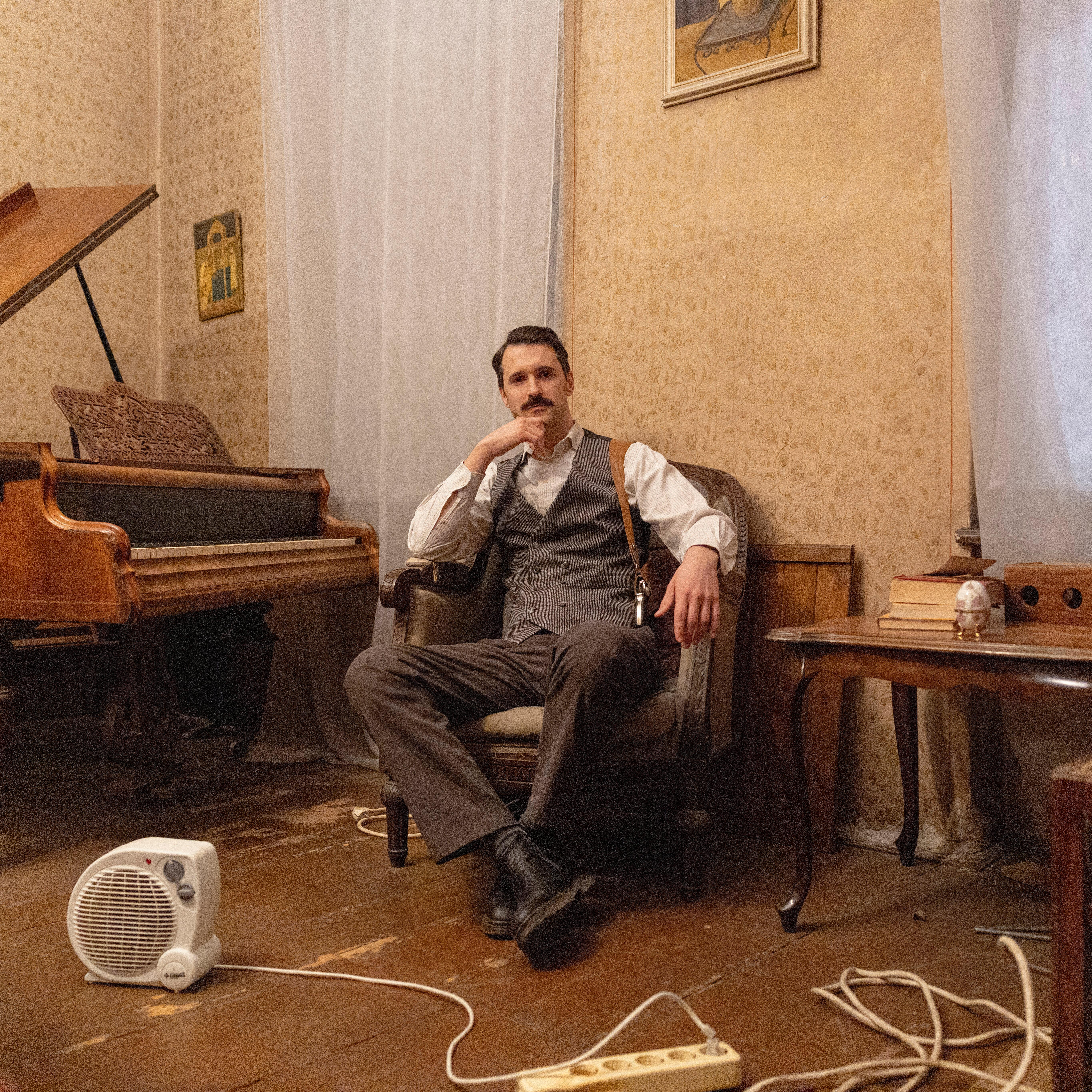 Milan Vukajlovic, an amateur actor, poses for a photograph in...