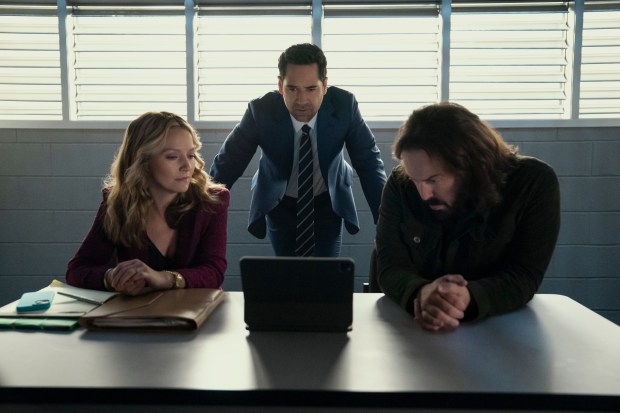 Becki Newton as Lorna Crane, Manuel Garcia-Rulfo as Mickey Haller, and Angus Sampson as Denis "Cisco" Wojciechowski in a scene from "The Lincoln Lawyer." (Photo Kim Alexis/Netflix)