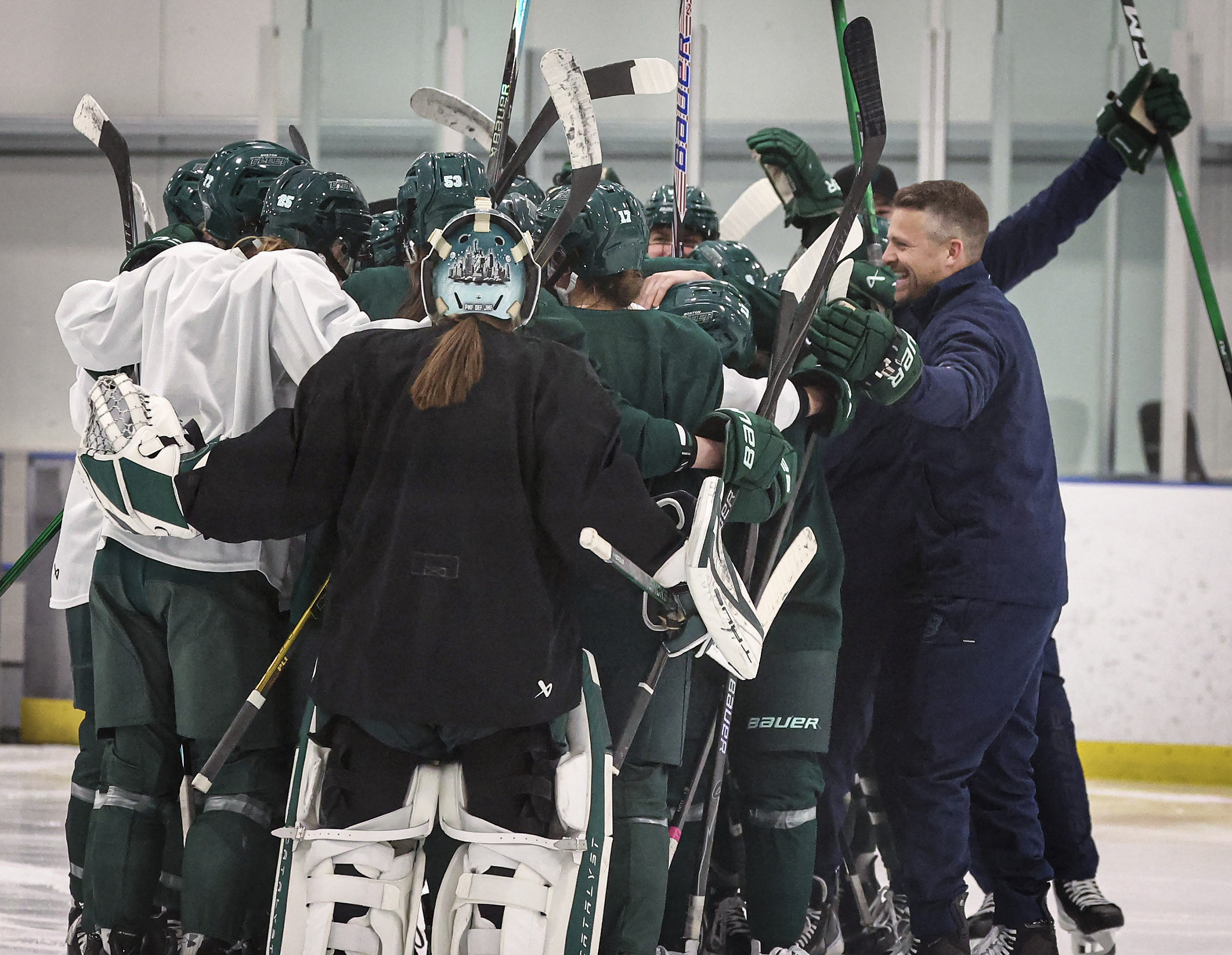 Boston Fleet womens hockey team and head coach Kris Sparre,...