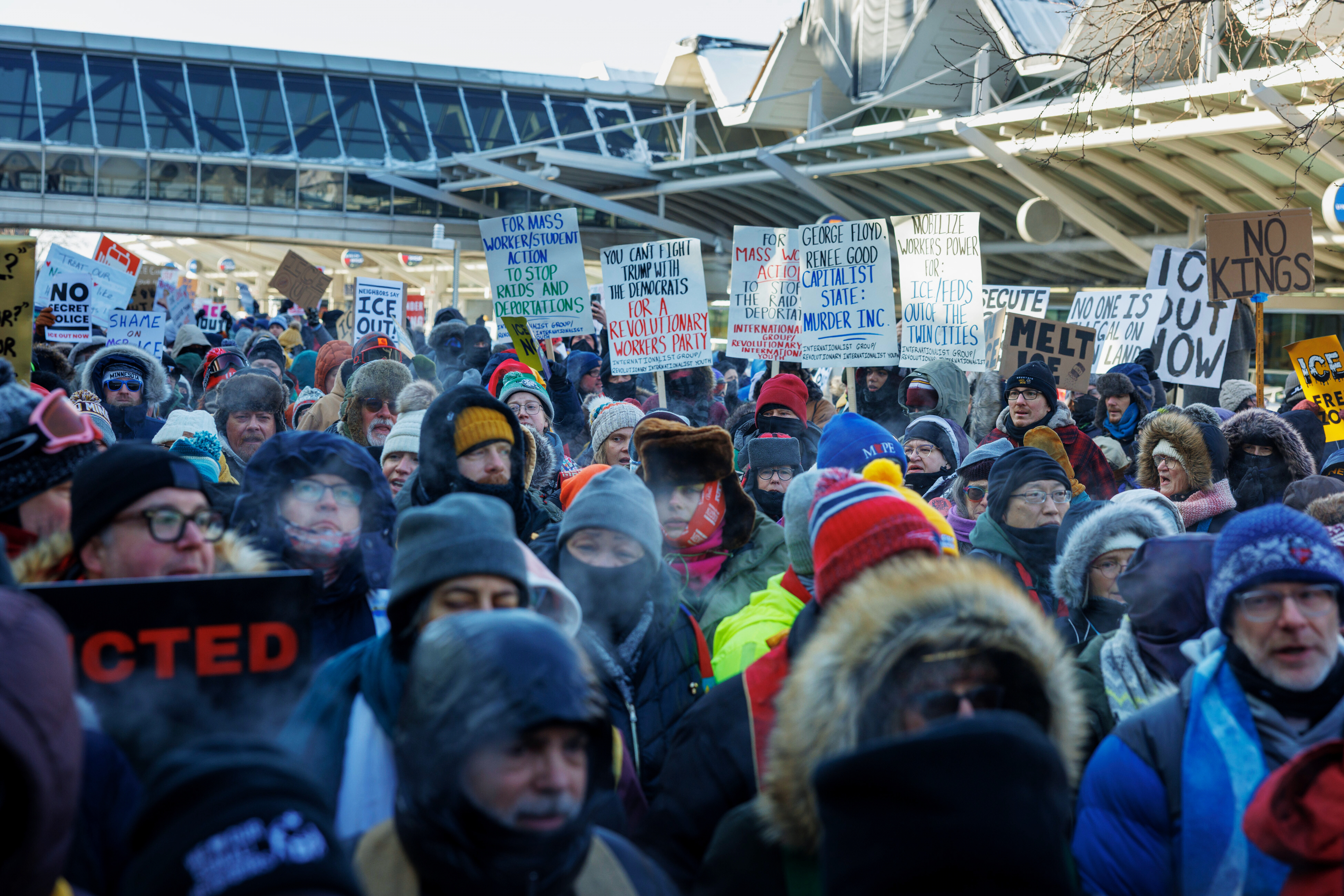 Clergy members and community activists gather at the Minneapolis-St. Paul International Airport, to protest deportation flights