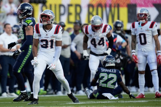 New England Patriots safety Craig Woodson (31) reacts during the first half of Super Bowl LX against the Seattle Seahawks, Sunday, Feb. 8, 2026, in Santa Clara, Calif. (AP Photo/Steve Luciano)